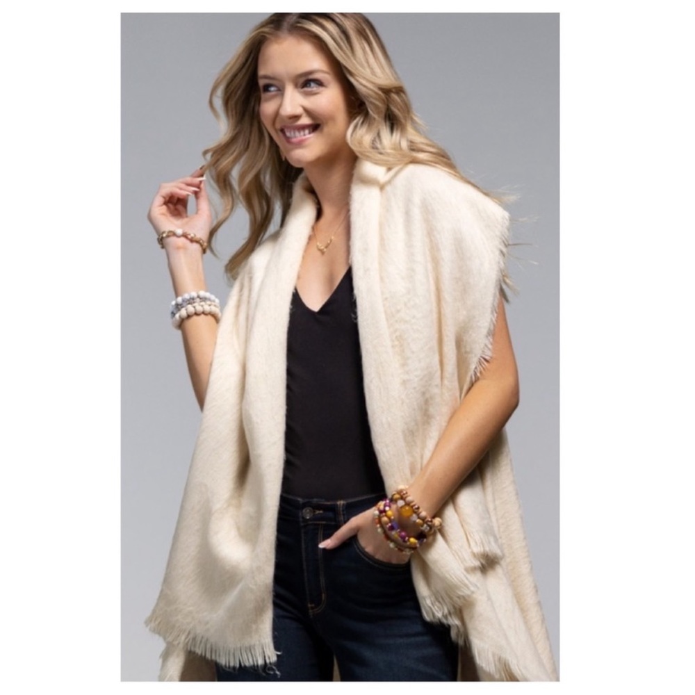 Ivory cascading vest